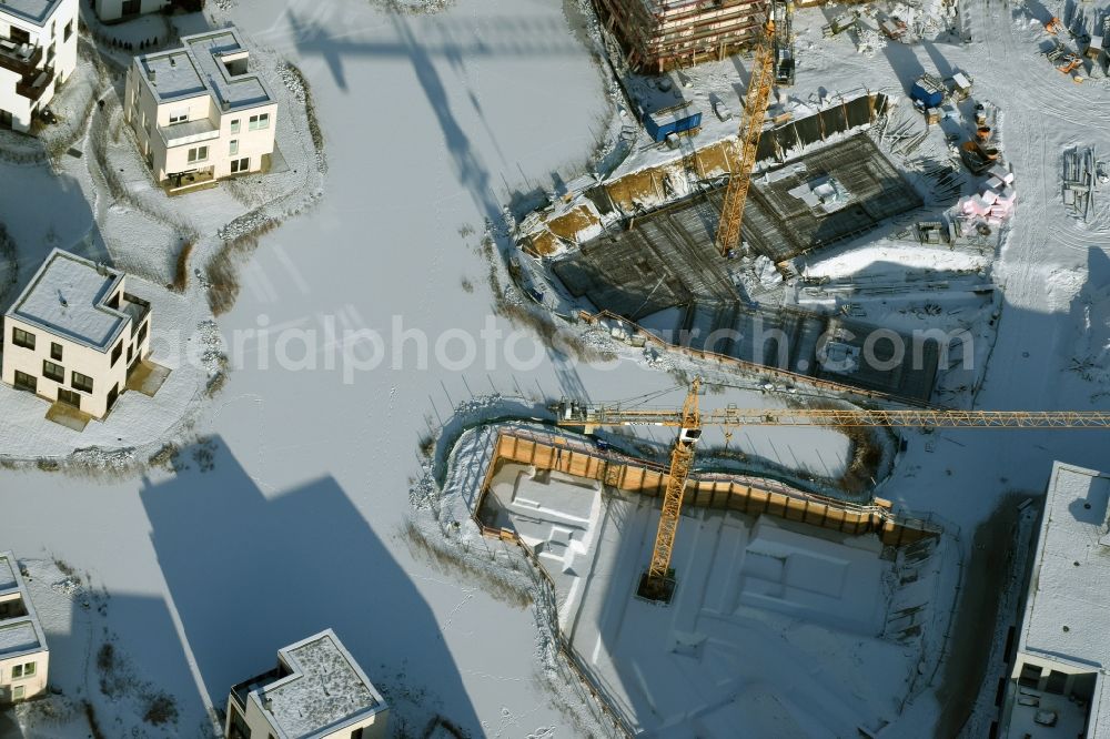 Aerial image Berlin - Wintry snowy building construction residential complex Five morning Dahlem Urban Village of STOFANEL group in Berlin