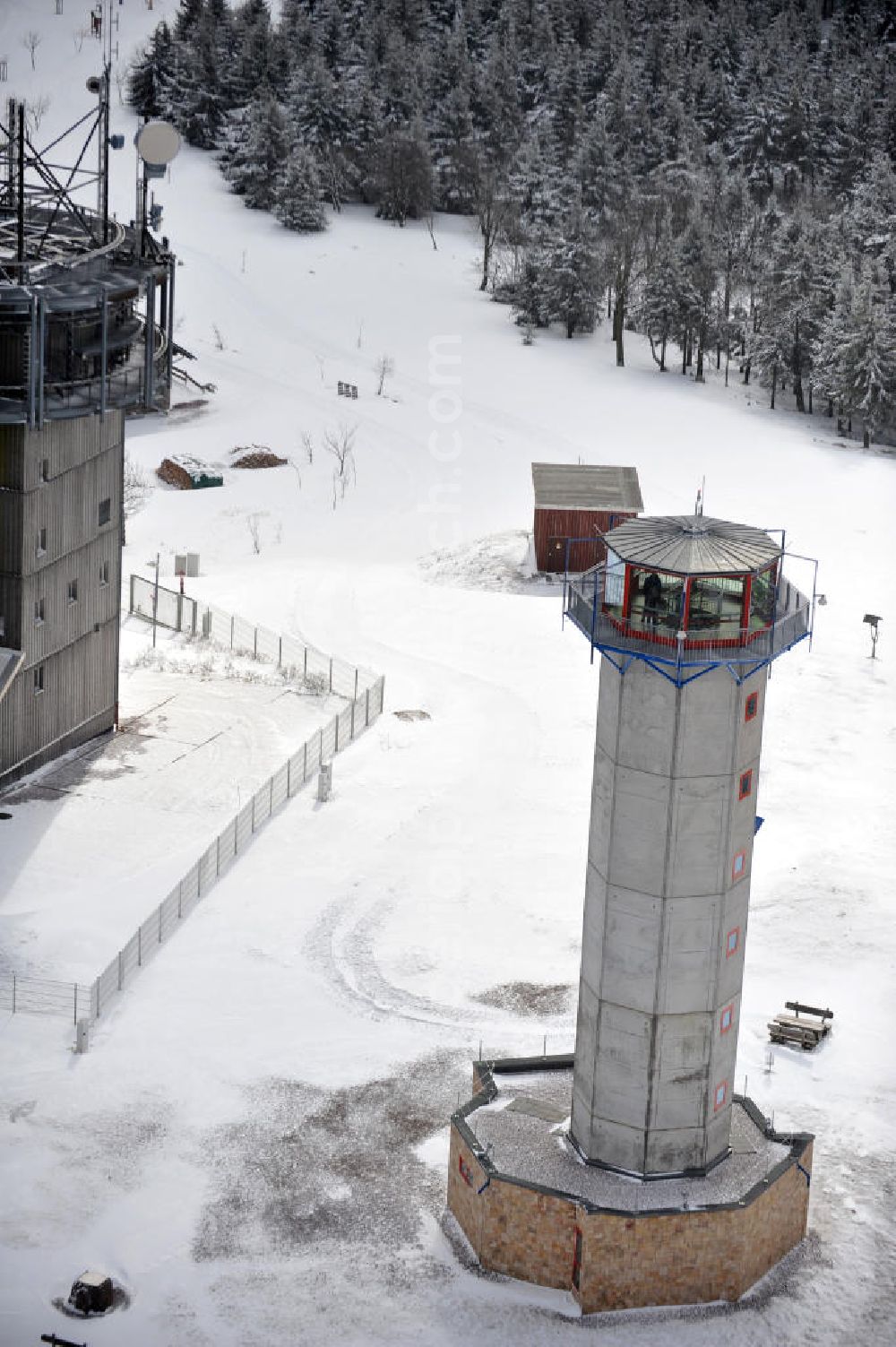 Aerial image Gehlberg - Gehlberg 03/08/2012 Wintry snow-covered hill on the snow head, the second-highest peak of the Thuringian Forest. The summit plateau is home to set up the GDR broadcasting or telecommunications tower and the new observation tower