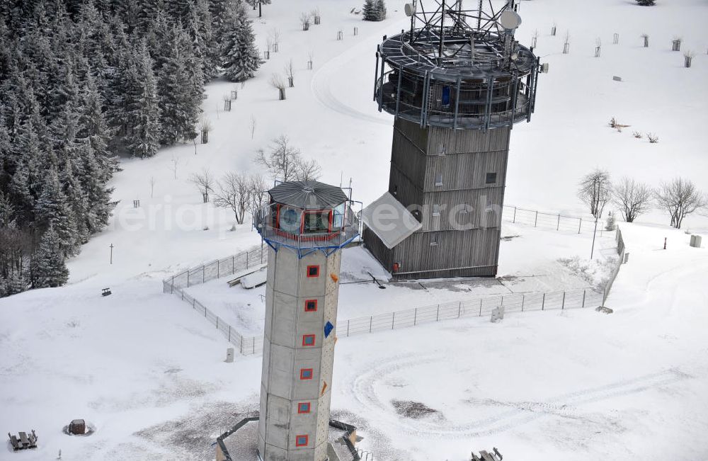 Aerial photograph Gehlberg - Gehlberg 03/08/2012 Wintry snow-covered hill on the snow head, the second-highest peak of the Thuringian Forest. The summit plateau is home to set up the GDR broadcasting or telecommunications tower and the new observation tower