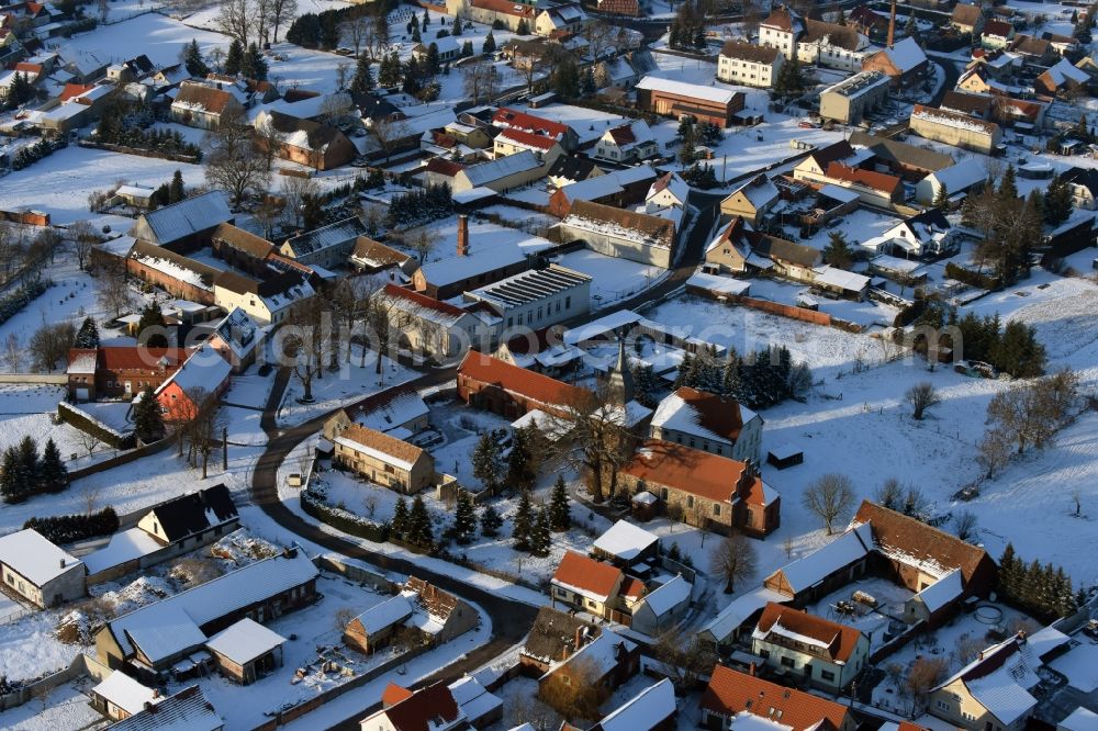 Genthin from the bird's eye view: Wintry snowy village view in Gladau in the state Saxony-Anhalt