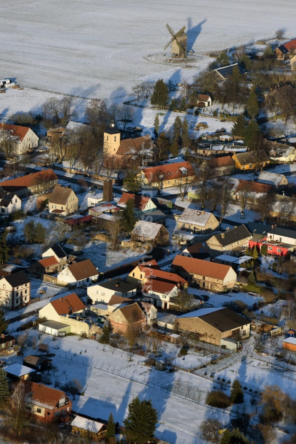 Aerial image Beetzseeheide - Wintry snowy village view in Ketzuer in the state Brandenburg