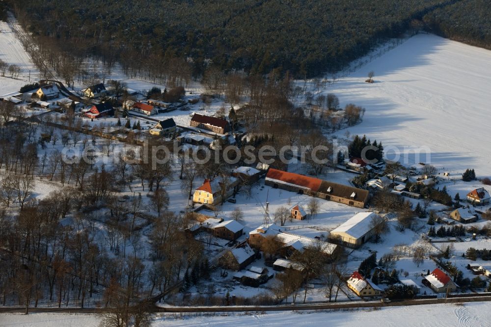 Aerial photograph Pietzpuhl - Wintry snowy village view in Pietzpuhl in the state Saxony-Anhalt