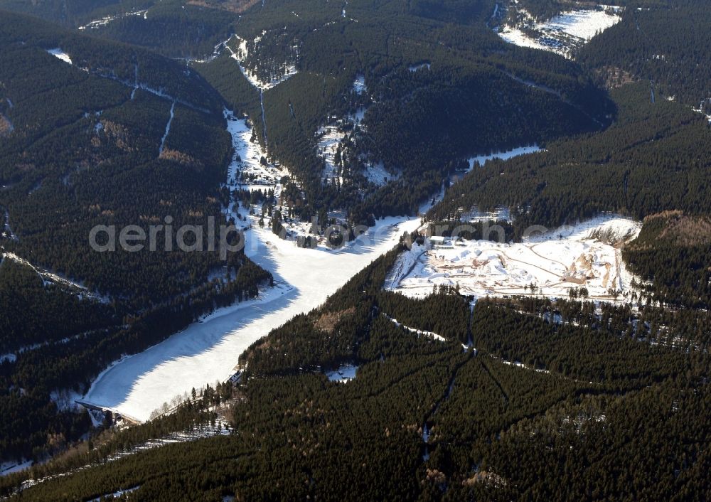 Aerial image Frankenhain - Winter snow covered ice on the lake of the dam Loetschetalsperre in Frankenhain in Thuringia