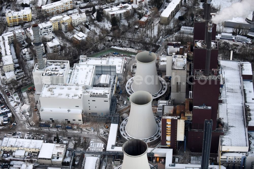 Berlin from above - Wintry snowy exhaust towers of the Vattenfall Europe AG at the canal eltowkanal in Berlin Lichterfelde