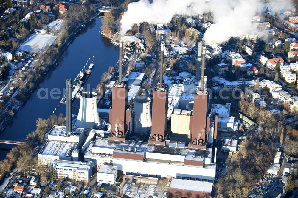 Aerial image Berlin - Wintry snowy exhaust towers of the Vattenfall Europe AG at the canal eltowkanal in Berlin Lichterfelde