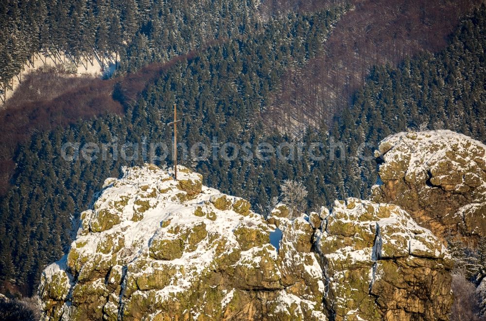 Olsberg from the bird's eye view: Wintry snowy rock formation Bruchhauser stones near Brilon in the state of North Rhine-Westphalia. The known archaeological site is located in a conservation area of the Rothaargebirge