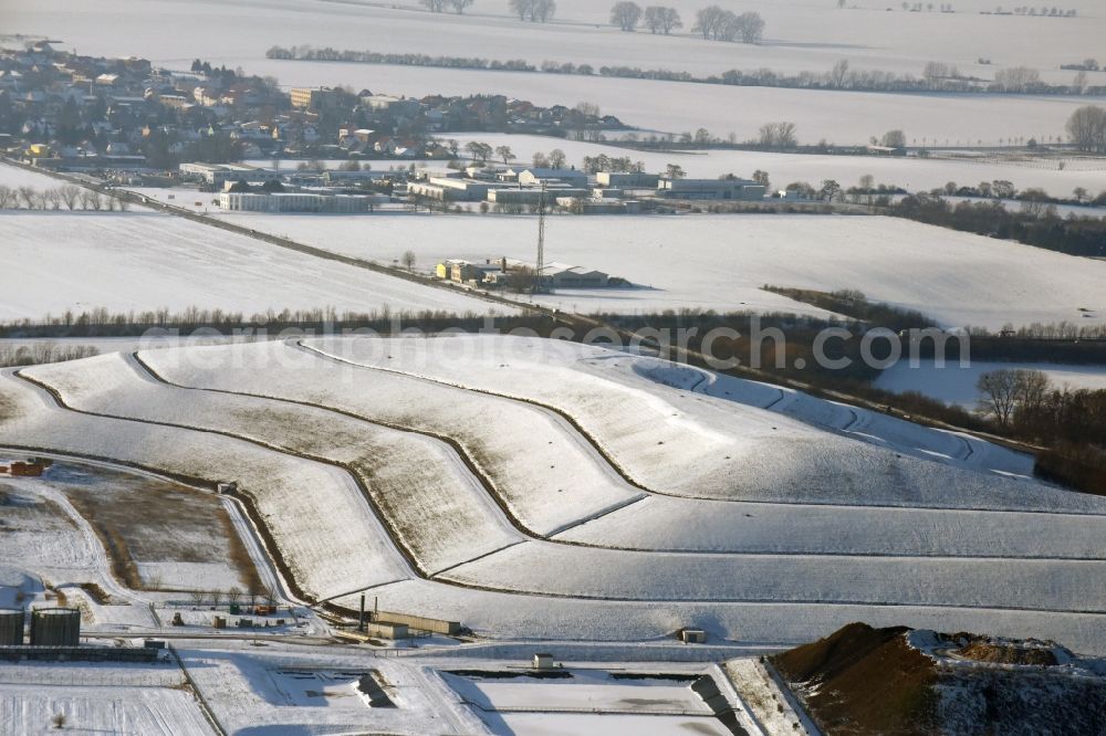 Magdeburg from the bird's eye view: Winterly snowy site of heaped landfill of RSC GmbH in Magdeburg in the state Saxony-Anhalt