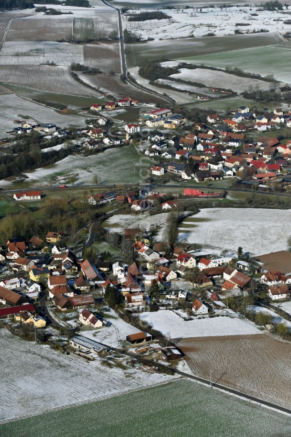 Velburg from above - Wintry snowy townscape with streets and houses of the residential areas in Oberwiesenacker in the state Bavaria