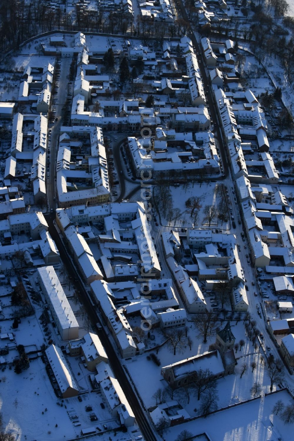 Aerial photograph Altlandsberg - Wintry snowy Town View of the streets and houses of the residential areas in the district Altlandsberg in Altlandsberg in the state Brandenburg