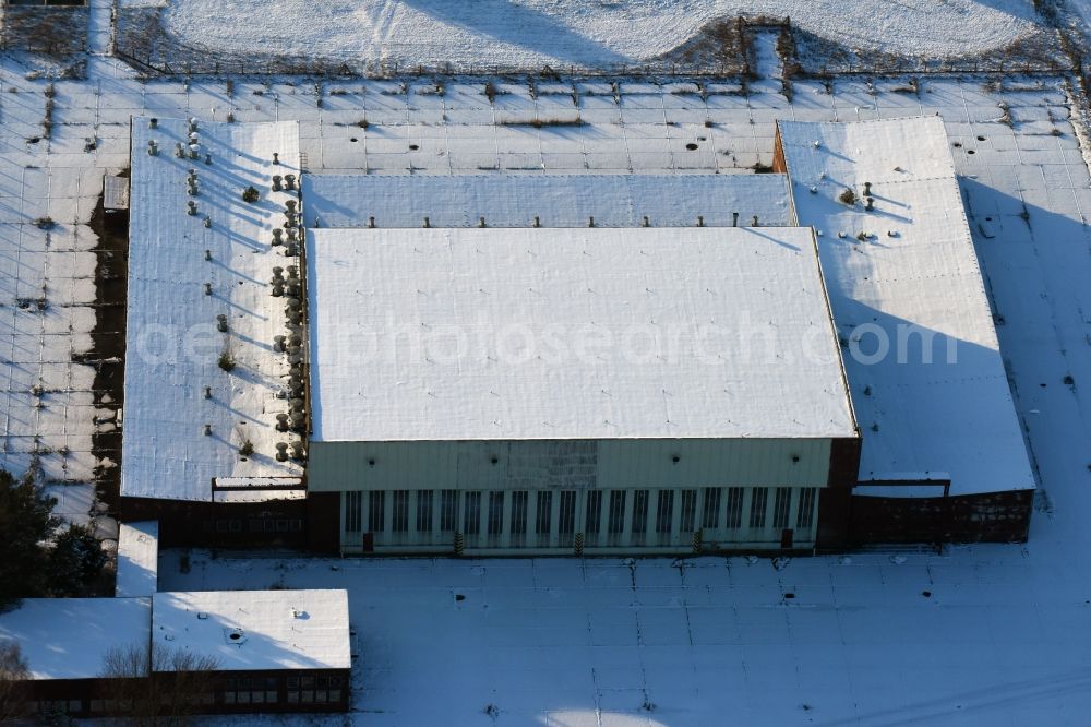 Brandenburg an der Havel from above - Winterly snowy ruins of the former airfield hangar of the former airfield Brandenburg-Briest in Brandenburg an der Havel in the state Brandenburg