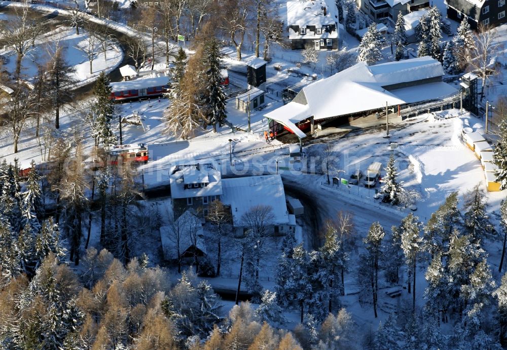 Aerial image Obstfelderschmiede - Snow-covered station of the Schwarzatal and Oberweissbacher Bergahn railway in Obstfelderschmiede in the state of Thuringia