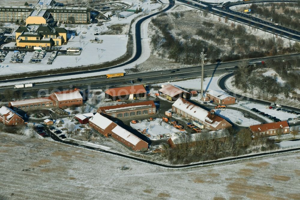 Blankenfelde-Mahlow from above - Wintry snowy depot of the motorway maintenance Rangsdorf on the Berliner Ring motorway A10 - E30 in Rangsdorf in Brandenburg