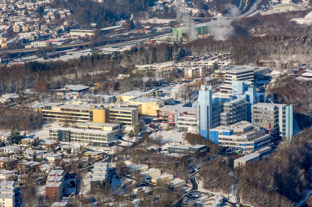 Siegen from the bird's eye view: Wintry snowy campus University- area of Adolf-Reichwein-Gebaeude in Siegen in the state North Rhine-Westphalia