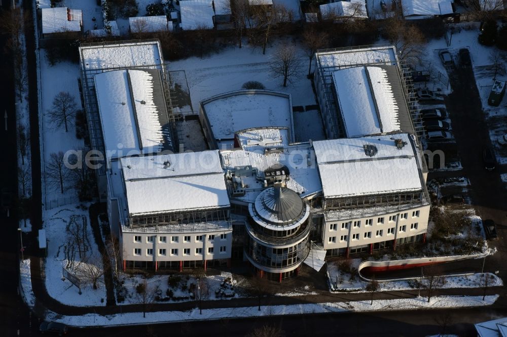 Aerial image Magdeburg - Winterly snowy complex of the radio station radio SAW in Hansapark in Magdeburg in the state Saxony-Anhalt