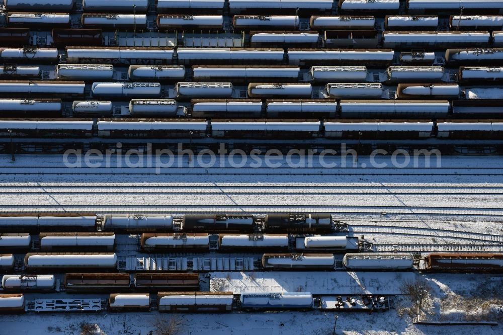 Aerial image Brandenburg an der Havel - Wintry snowy marshalling yard and freight station of the Deutsche Bahn in Brandenburg an der Havel in the state Brandenburg