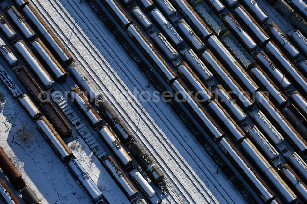 Brandenburg an der Havel from above - Wintry snowy marshalling yard and freight station of the Deutsche Bahn in Brandenburg an der Havel in the state Brandenburg