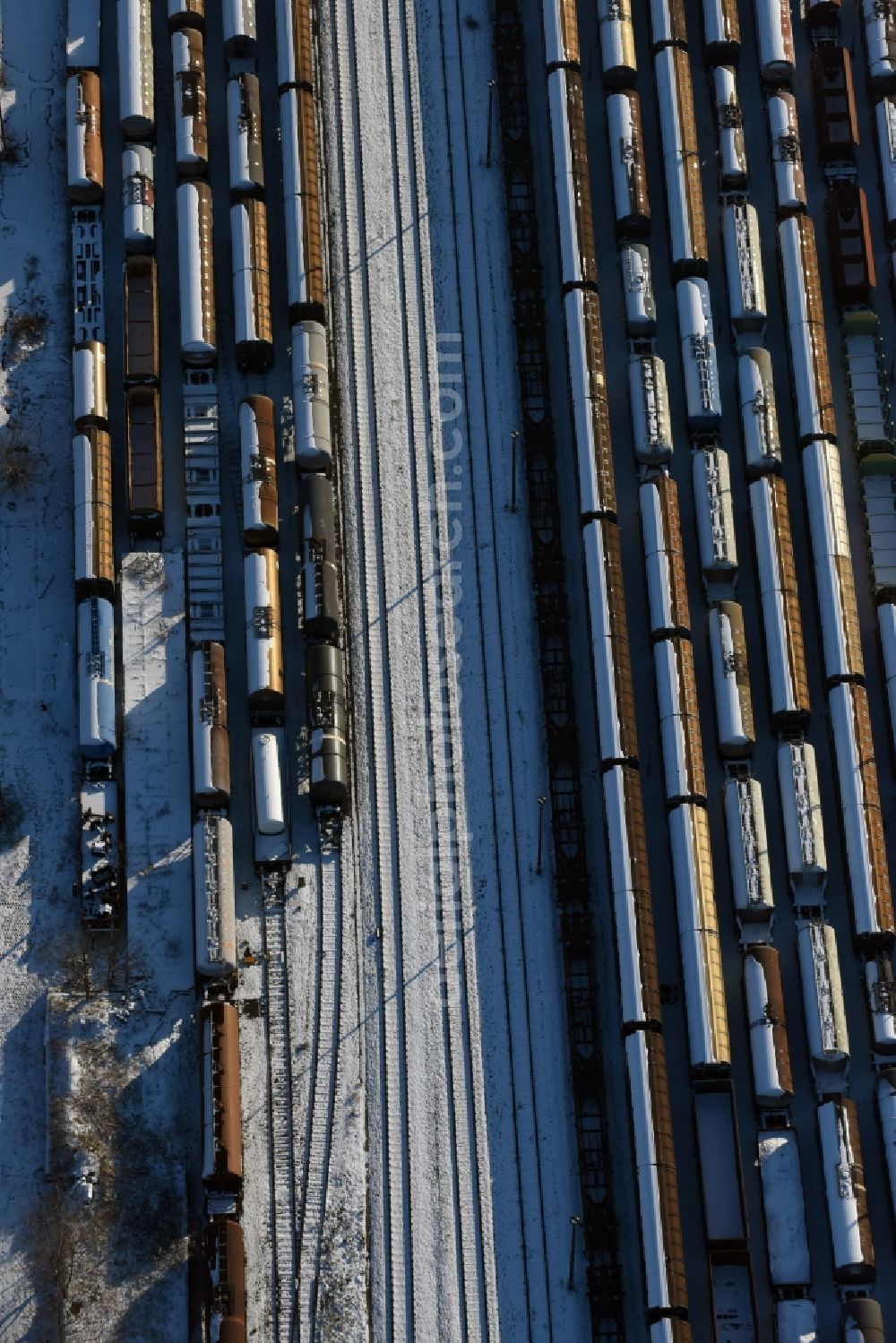 Aerial image Brandenburg an der Havel - Wintry snowy marshalling yard and freight station of the Deutsche Bahn in Brandenburg an der Havel in the state Brandenburg