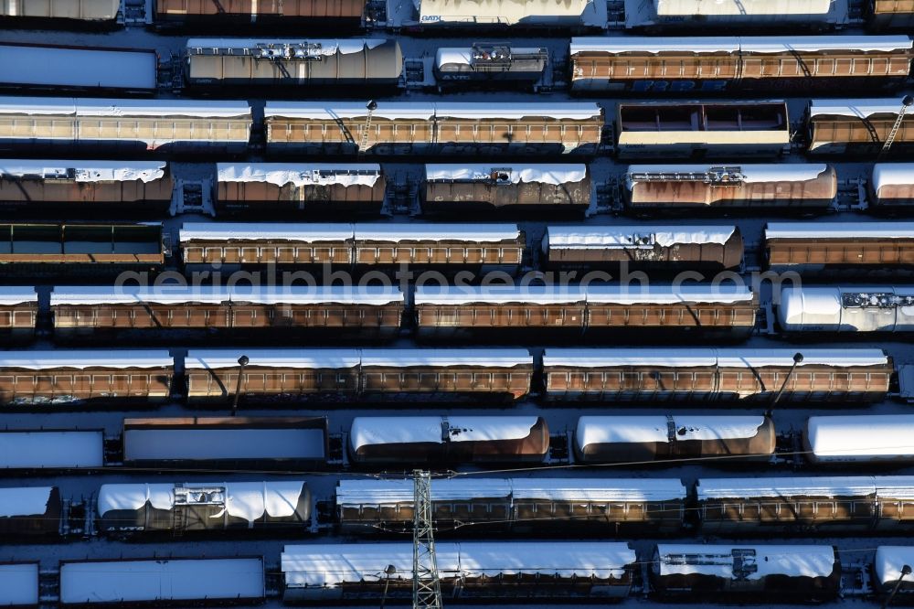 Brandenburg an der Havel from the bird's eye view: Wintry snowy marshalling yard and freight station of the Deutsche Bahn in Brandenburg an der Havel in the state Brandenburg