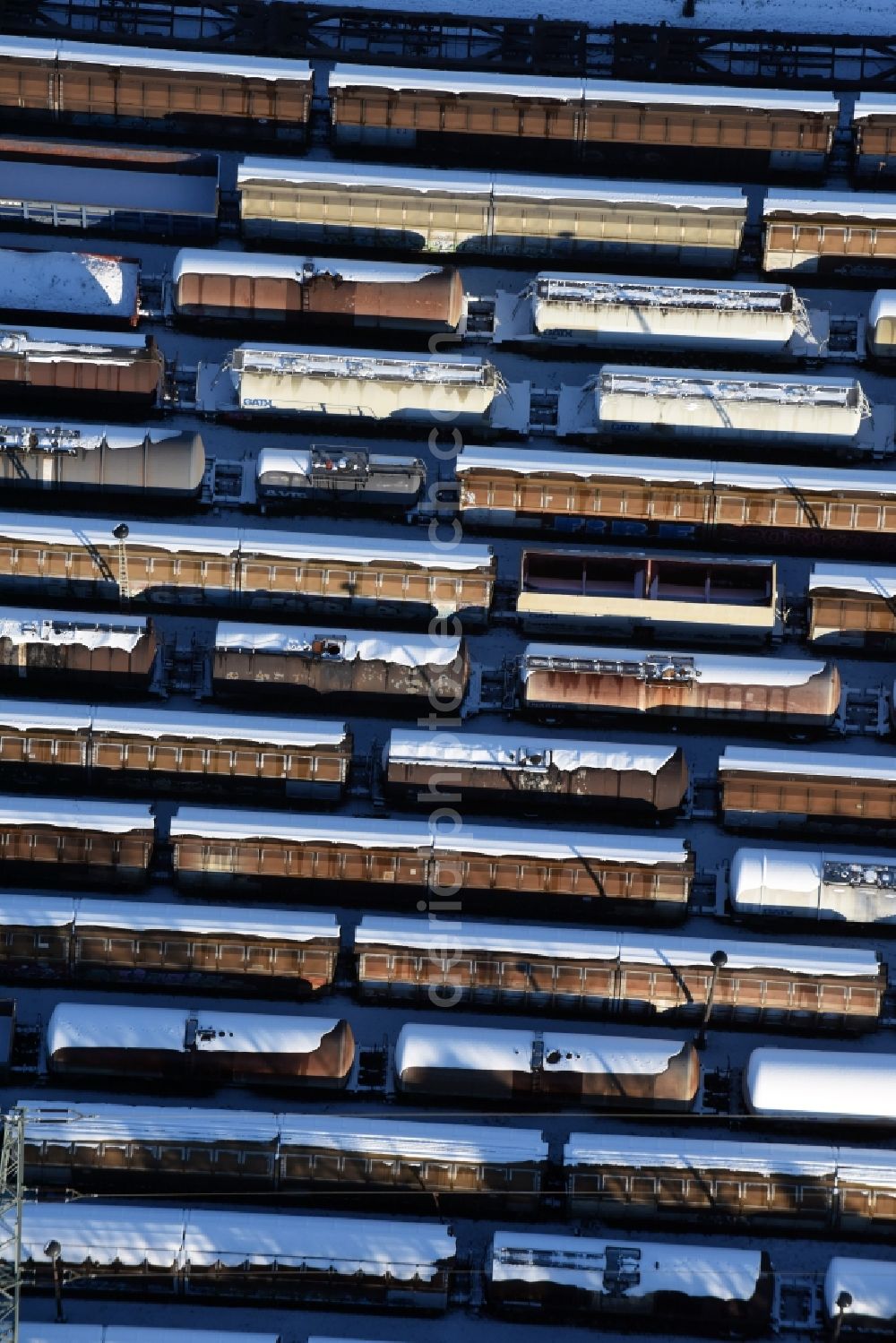 Aerial image Brandenburg an der Havel - Wintry snowy marshalling yard and freight station of the Deutsche Bahn in Brandenburg an der Havel in the state Brandenburg