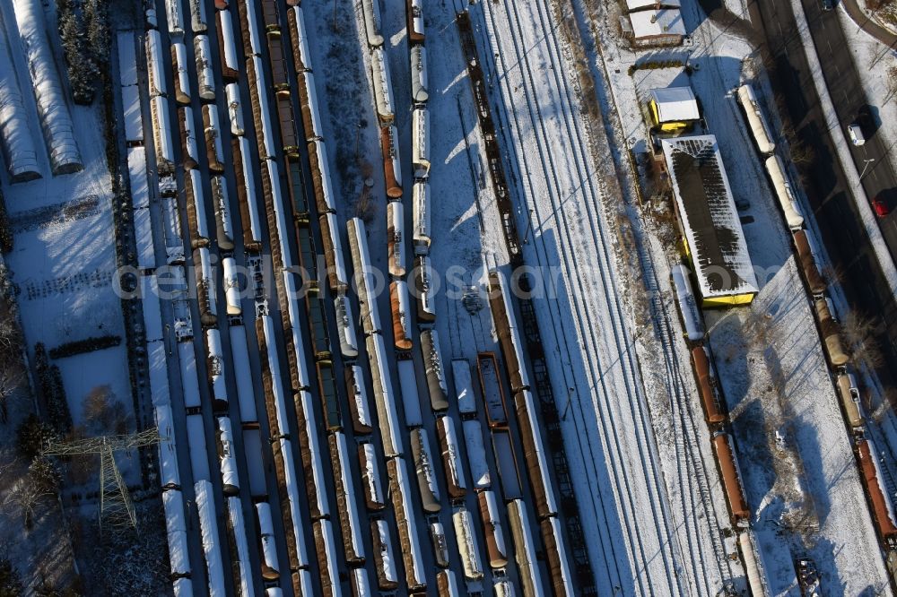 Brandenburg an der Havel from above - Wintry snowy marshalling yard and freight station of the Deutsche Bahn in Brandenburg an der Havel in the state Brandenburg