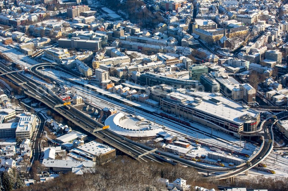 Siegen from above - Wintry snowy marshalling yard and freight station of the Deutsche Bahn an shopping center City-Galerie of ECE in Siegen in the state North Rhine-Westphalia