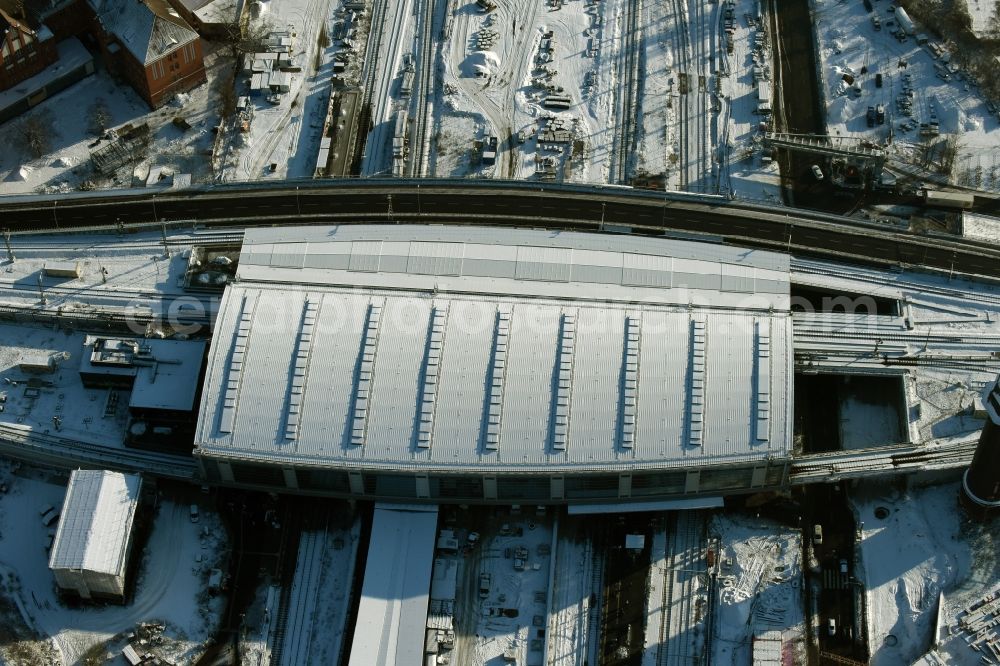 Berlin from above - Wintry snowy terrain route expansion station - Warschauer road to east cross rail station Ostkreuz Friedrichshain district of Berlin