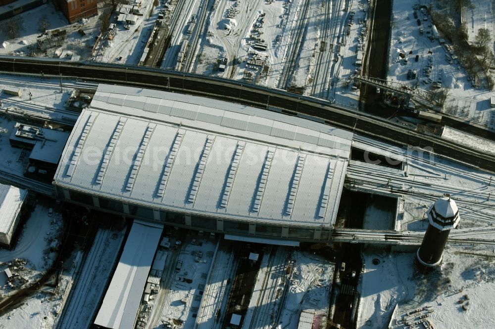 Berlin from the bird's eye view: Wintry snowy terrain route expansion station - Warschauer road to east cross rail station Ostkreuz Friedrichshain district of Berlin