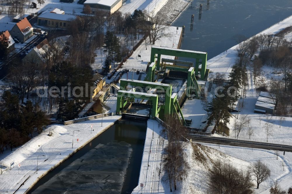 Rothensee from the bird's eye view: Wintry snowy old ship lifting Rothensee on the Elbe-Havel Canal to the waterway intersection with MD Rothensee in Saxony-Anhalt