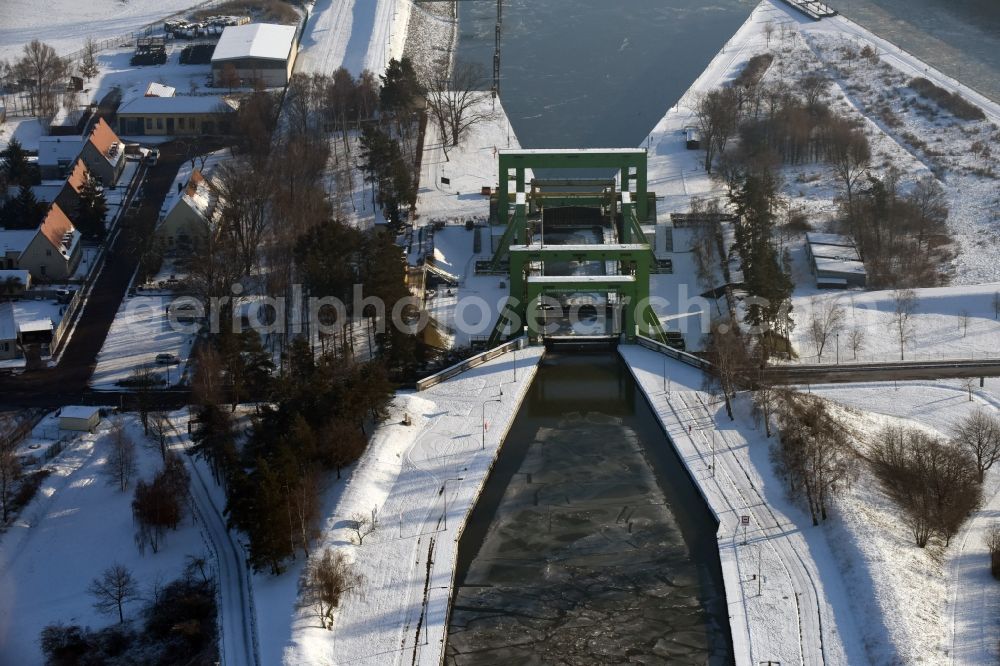 Aerial photograph Rothensee - Wintry snowy old ship lifting Rothensee on the Elbe-Havel Canal to the waterway intersection with MD Rothensee in Saxony-Anhalt