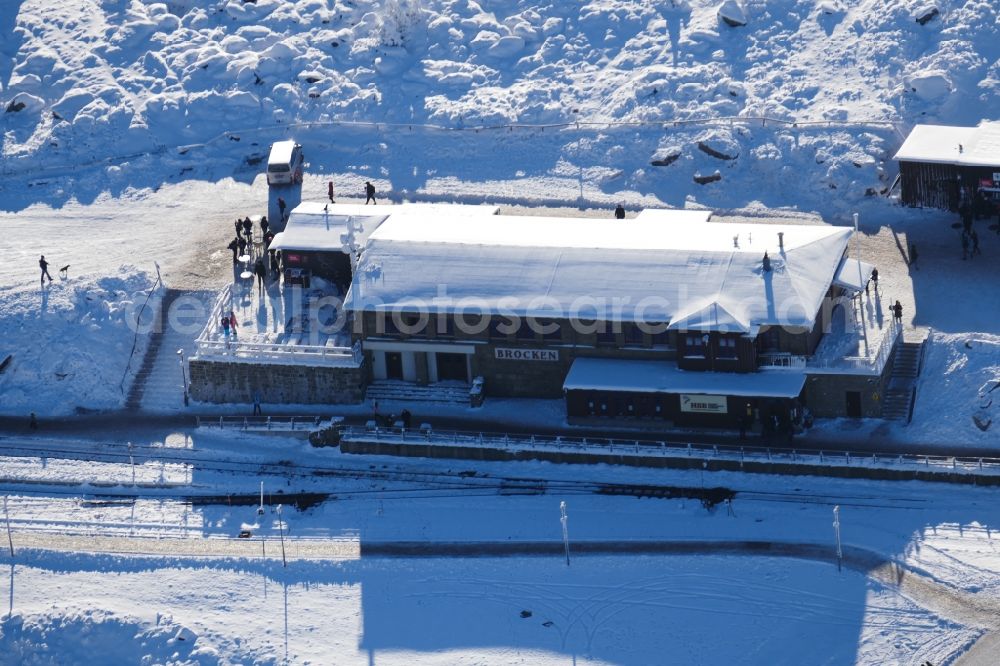 Aerial photograph Brocken - Wintry snowy station railway building on top of mountain Brocken in the state Saxony-Anhalt