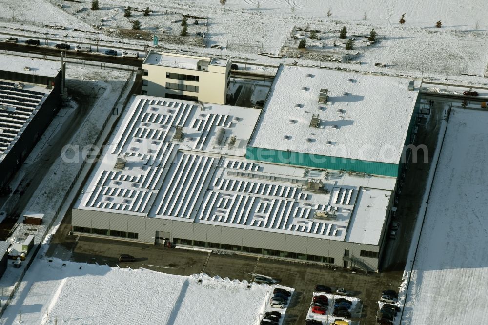 Berlin from the bird's eye view: Snow-covered building of the companies Ahlberg Metalltechnik GmbH and Werner Scholz GmbH in the technology park of Adlershof in Berlin in Germany