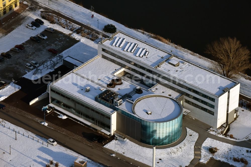 Magdeburg from the bird's eye view: Winterly snowy research building and office complex Virtual Development and Training Centre VDTC of Fraunhofer IFF in Joseph-von-Fraunhofer-Strasse in Magdeburg in the state Saxony-Anhalt