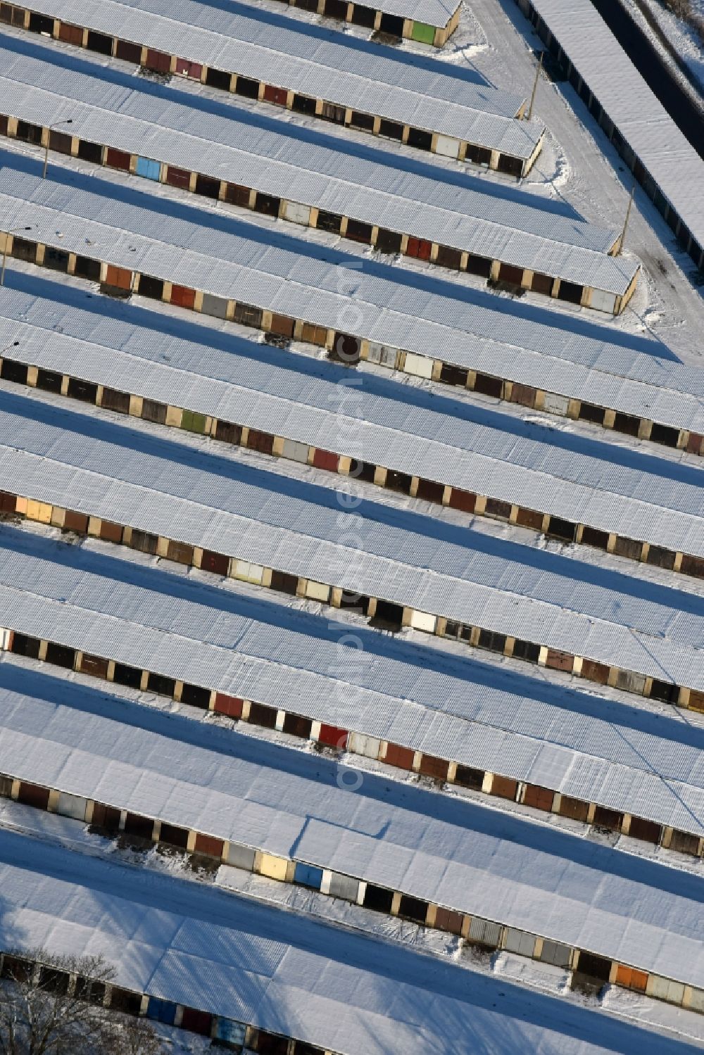 Aerial image Burg - Winterly snowy garage - grounds for automobiles in Burg in the state Saxony-Anhalt