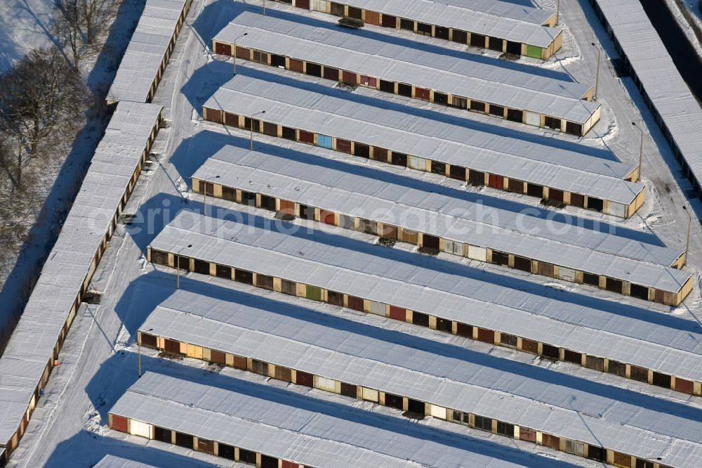 Aerial photograph Burg - Winterly snowy garage - grounds for automobiles in Burg in the state Saxony-Anhalt