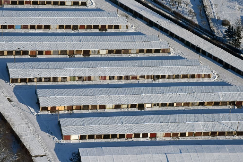 Burg from above - Winterly snowy garage - grounds for automobiles in Burg in the state Saxony-Anhalt