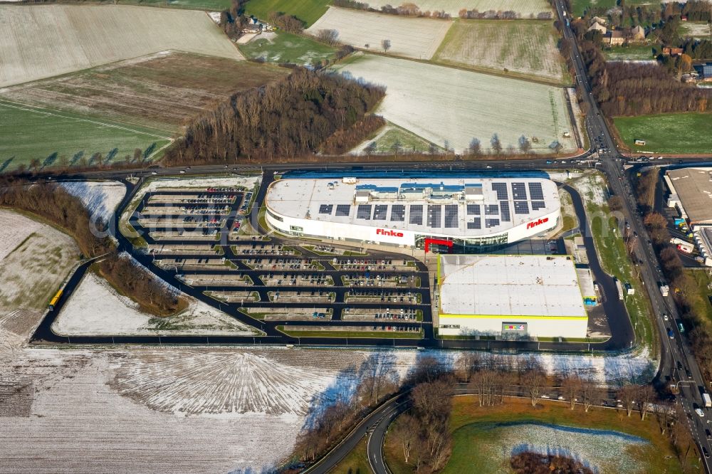 Aerial photograph Hamm - Wintry snowy building of the store - furniture market finke Das Erlebnis-Einrichten GmbH & Co. KG in Hamm in the state North Rhine-Westphalia