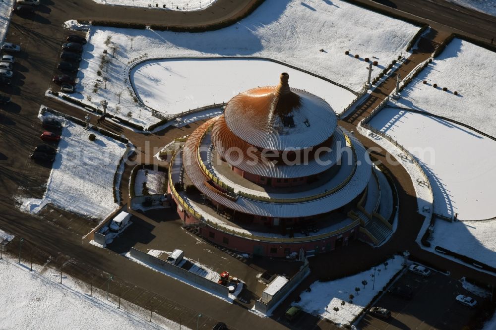 Hohen Neuendorf from above - Wintry snowy Building of the restaurant Himmelspagode Himmelspagode an der Oranienburger Strasse in Hohen Neuendorf in the state Brandenburg