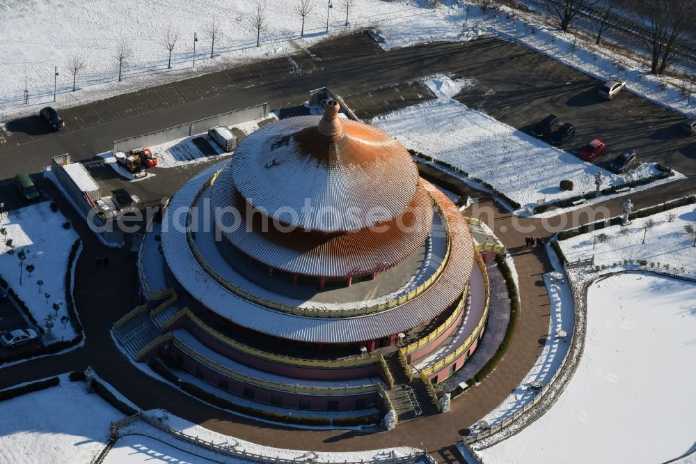 Hohen Neuendorf from the bird's eye view: Wintry snowy Building of the restaurant Himmelspagode Himmelspagode an der Oranienburger Strasse in Hohen Neuendorf in the state Brandenburg