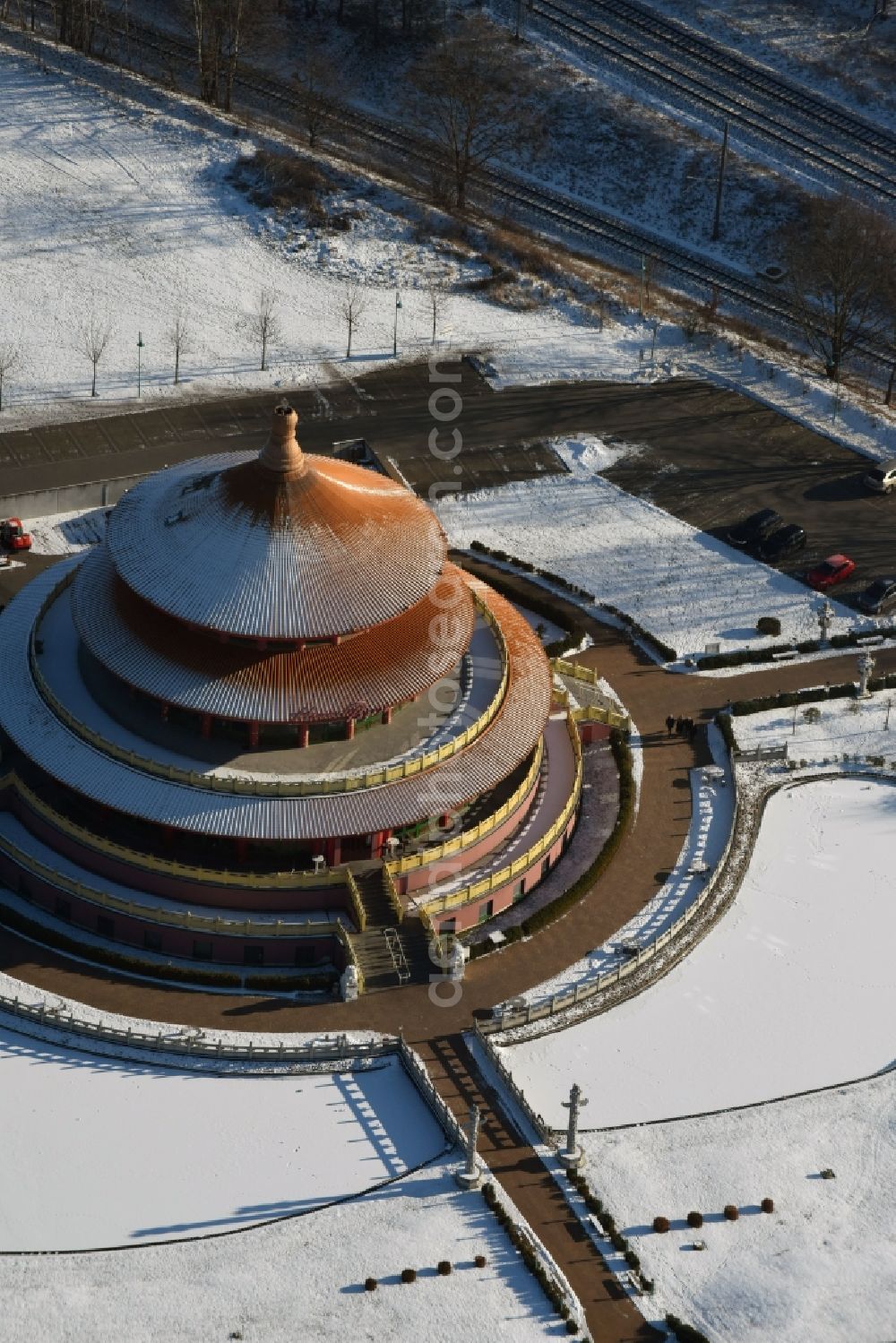 Aerial image Hohen Neuendorf - Wintry snowy Building of the restaurant Himmelspagode Himmelspagode an der Oranienburger Strasse in Hohen Neuendorf in the state Brandenburg