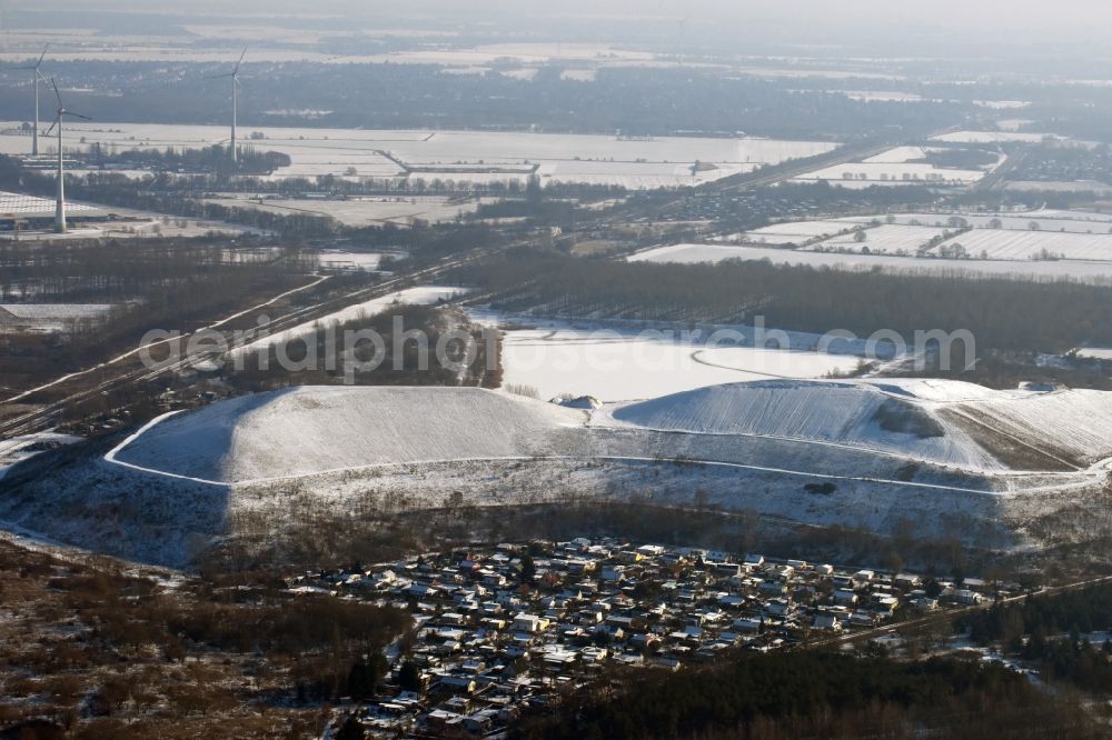 Berlin from the bird's eye view: Wintry snowy site of heaped landfill in Berlin in Germany