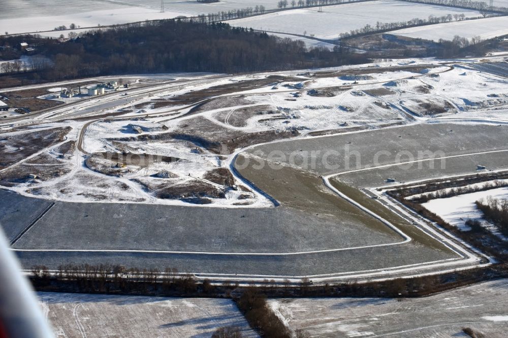 Aerial photograph Ketzin - Wintry snowy site of heaped landfill in Ketzin in the state Brandenburg