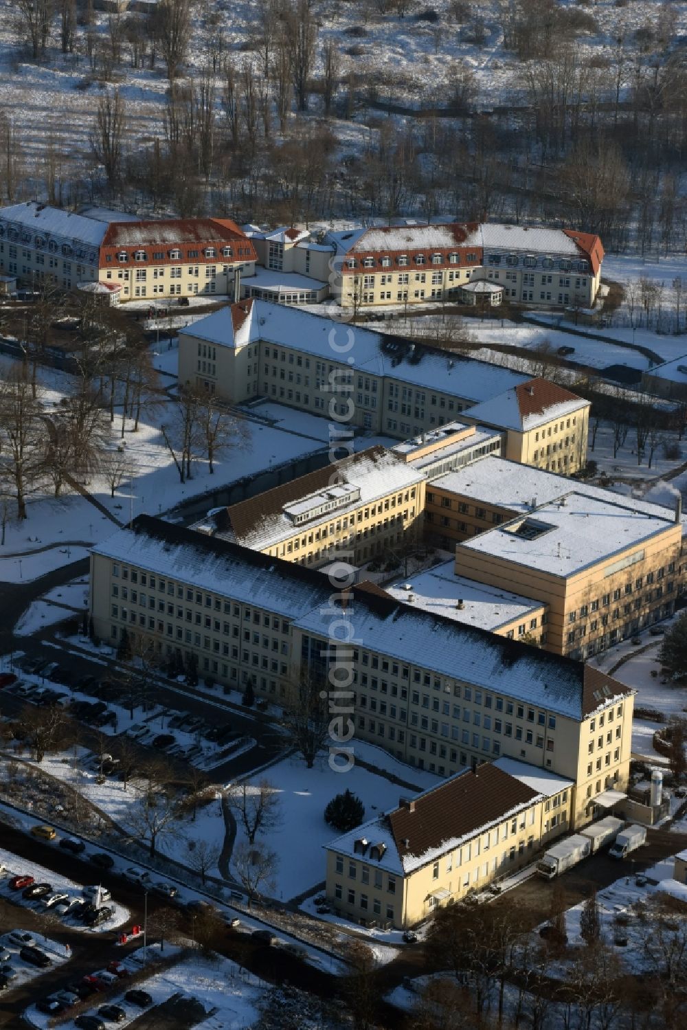 Burg from above - View of the winterly snowy hospital Jerichower Land in Burg in the state of Saxony-Anhalt