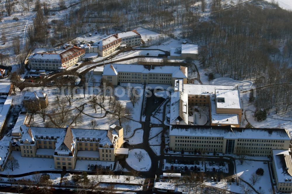 Burg from the bird's eye view: View of the winterly snowy hospital Jerichower Land in Burg in the state of Saxony-Anhalt