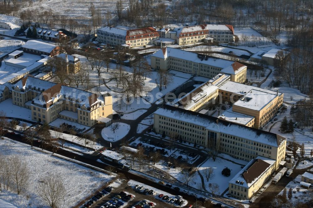 Aerial image Burg - View of the winterly snowy hospital Jerichower Land in Burg in the state of Saxony-Anhalt