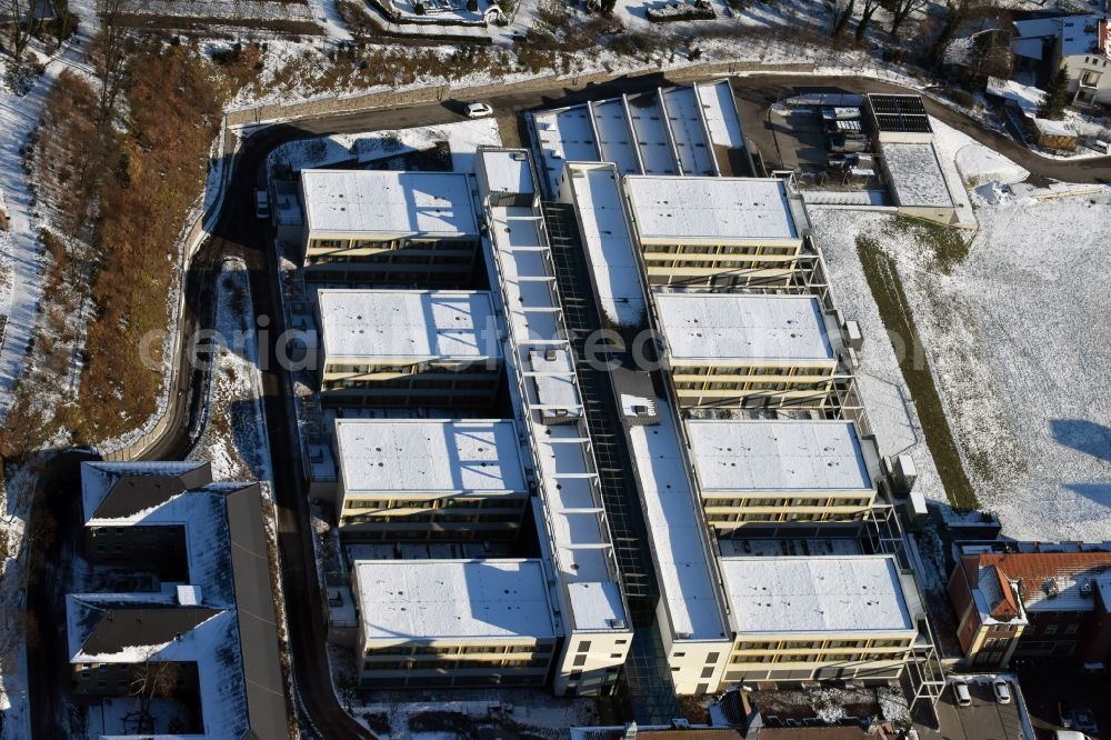 Aerial photograph Brandenburg an der Havel - Winterly snowy clinic on the hospital grounds Staedtisches Klinikum in Brandenburg an der Havel in the state Brandenburg