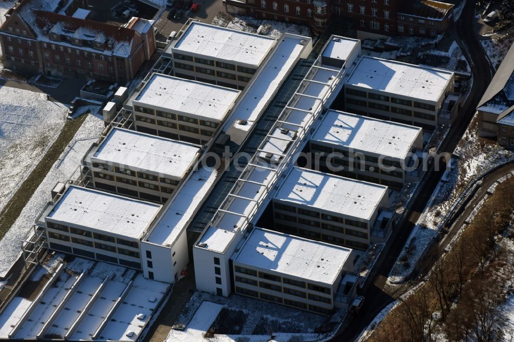 Aerial photograph Brandenburg an der Havel - Winterly snowy clinic on the hospital grounds Staedtisches Klinikum in Brandenburg an der Havel in the state Brandenburg