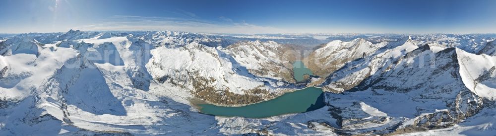 Aerial image Kaprun - Wintry snowy Panorama and mountain landscape am Stausee Wasserfallboden und Mooserboden in Kaprun in Austria