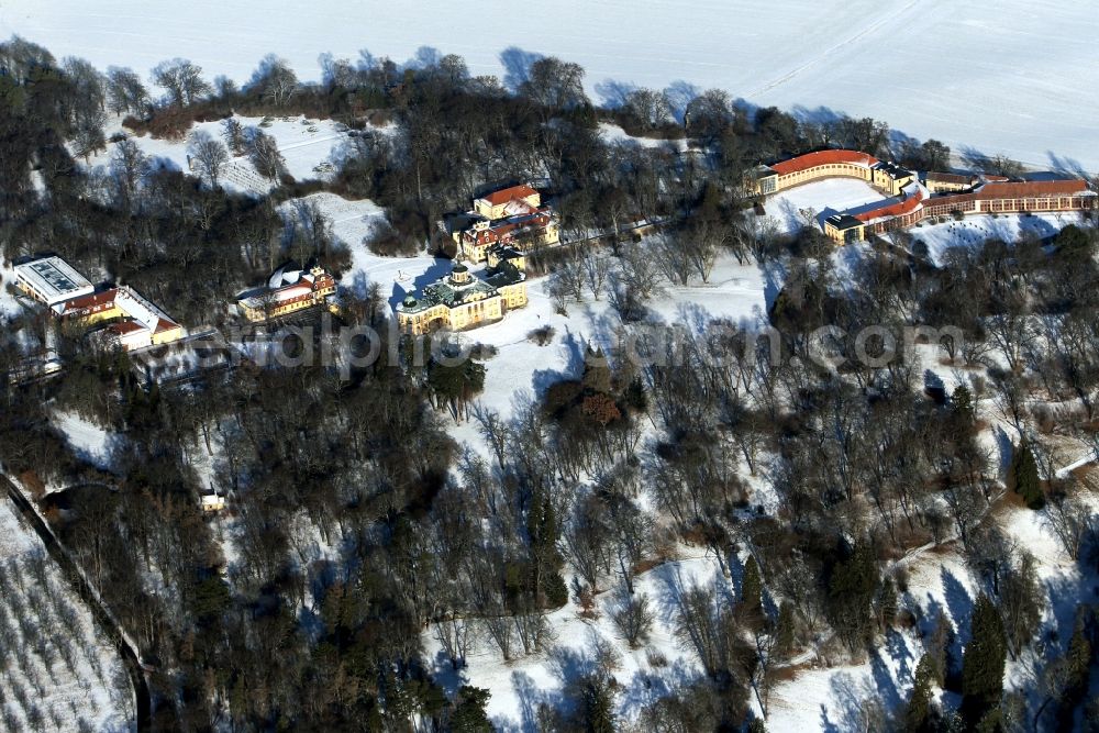 Weimar from the bird's eye view: Wintry snow-covered palace and castle Belvedere with the musical high school and the orangery in Weimar in the state of Thuringia