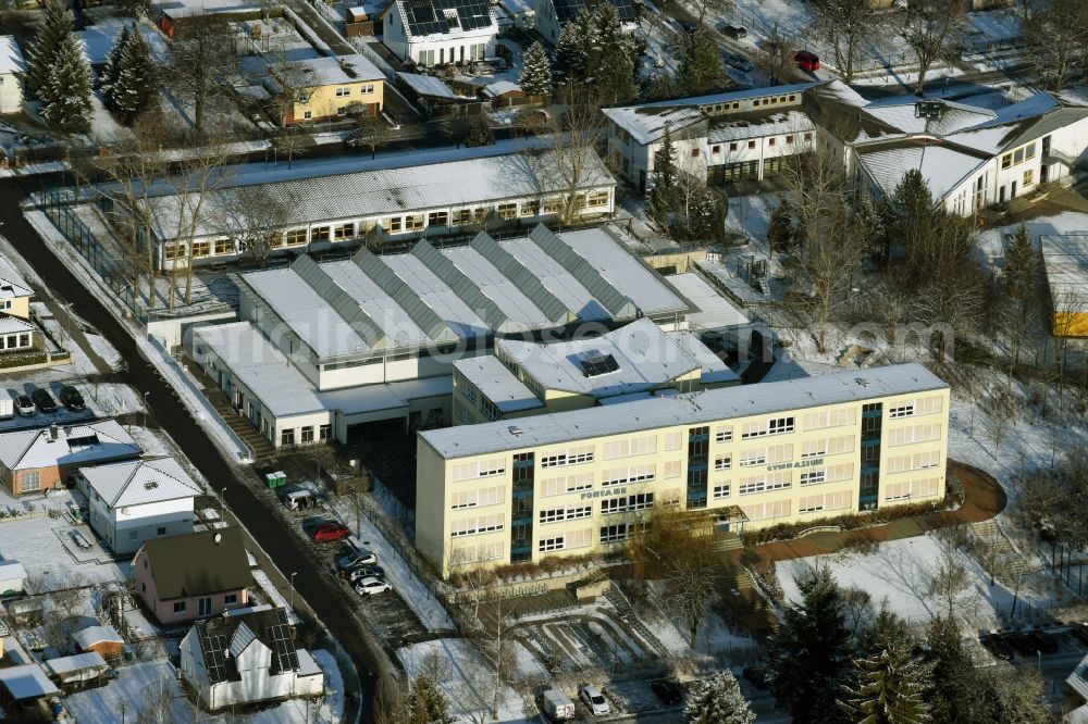 Rangsdorf from the bird's eye view: Winterly snowy school building of the Fontane Gymnasium in Rangsdorf in the state Brandenburg