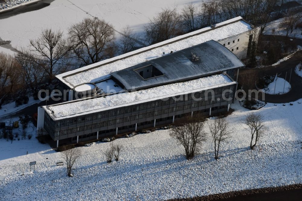 Aerial photograph Magdeburg - Wintry snowy administrative building of the State Authority WSNBA Wasserstrassen-Neubauamt am Kleiner Werder in Magdeburg in the state Saxony-Anhalt